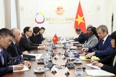 At the talks between Politburo member and Minister of Foreign Affairs Le Hoai Trung and Secretary-General of the International Organisation of La Francophonie (OIF) Louise Mushikiwabo in Hanoi on March 6. (Photo: VNA)