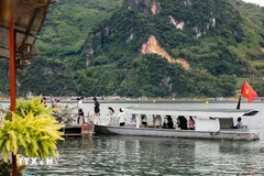 Tourists visit Hoa Binh Lake. (Photo: VNA)