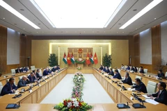 At the meeting between Prime Minister Pham Minh Chinh and Speaker of the Jordanian House of Representatives Mazen Turki El Qadi in Hanoi on the morning of February 3. (Photo: VNA)