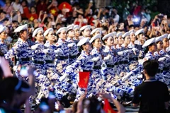 Military medical formation passes Nguyen Thai Hoc Street during the rehearsal in Hanoi on August 21. (Photo: VNA) 