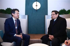 Prime Minister Pham Minh Chinh (right) and the Director General of the World Intellectual Property Organisation (WIPO) Daren Tang (Photo: VNA)