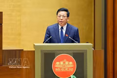 Minister of Construction Tran Hong Minh speaks at the session (Photo: VNA)