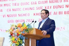 Prime Minister Pham Minh Chinh speaks at the conference. (Photo: VNA)