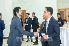 Representatives from Vietnamese and Italian businesses at the event. (Photo: VNA)