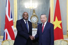 Party General Secretary To Lam (R) and UK Deputy Prime Minister David Lammy (Photo: VNA)