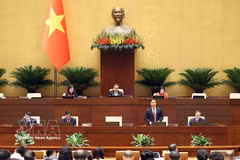 Lawmakers on August 9 discuss a draft law amending and supplementing a number of articles of the Law on the State Bank of Vietnam, the Law on Anti-Money Laundering and the Law on Credit Institutions. (Photo: VNA)