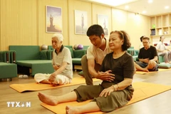 Elderly people take part in activities at a daytime care centre for senior citizens. (Photo: VNA)