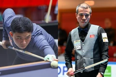 Vietnamese billiards players Bao Phuong Vinh (L) and Tran Quyet Chien compete at the 2025 World Championship 3-Cushion National Teams in Viersen, Germany. (Photo: Union Mondiale de Billard)