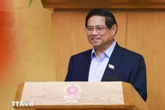 Prime Minister Pham Minh Chinh addresses the government meeting on May 9. (Photo: VNA)