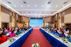 At the conference between VWU and Unilever Vietnam (Photo: VNA)