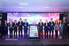 Viettel Post and FedEx announced their partnership (Photo: VNA)