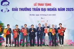 At the award ceremony (Photo: VNA)
