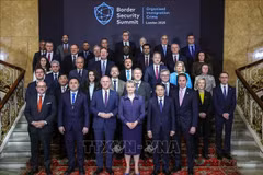 Minister of Public Security General Luong Tam Quang (second from right, first row) and other delegates at the Border Security Summit. (Photo: VNA)