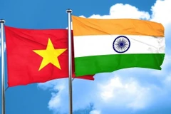 The flags of Vietnam and India. (Photo: baoquocte.vn) 