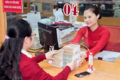 At an Agribank office. The banking sector is at the forefront of unblocking green capital flows. (Photo: VNA)