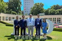 Minister Counsellor Pham Quang Huy, deputy head of Vietnam's Permanent Mission to Geneva and representatives of St. Gallen Endowment. (Photo: VNA)