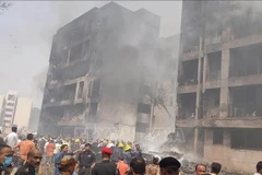 The scene of the deadly air accident in Ahmedabad, Gujarat, India) on June 12, 2025. (Photo: Xinhua/VNA)