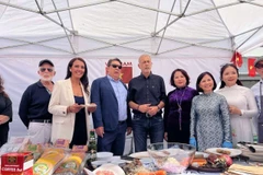 The Vietnamese booth at the “Piraeus Taste Festival 2025” welcomes international friends. (Photo courtesy of the Vietnamese Embassy in Greece)