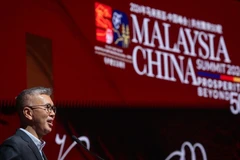 Malaysian Minister of Investment, Trade, and Industry Tengku Datuk Seri Zafrul Abdul Aziz addresses the Malaysia - China Summit 2024. (Photo: Malaymail)