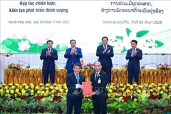 At the signing and exchange of cooperation agreements (Photo: VNA)