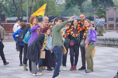 Foreign tourists visit the Hue Imperial City on the occasion of the New Year. (Photo: VNA)