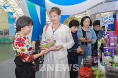 People visit Autumn Fair 2025. (Photo: VNA)