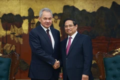 Prime Minister Pham Minh Chinh (right) and Secretary of the Security Council of the Russian Federation Sergey Shoigu at their meeting in Hanoi on December 9. (Photo: VNA)