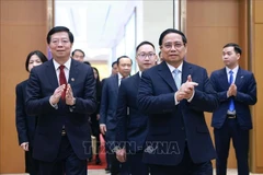 PM Pham Minh Chinh (R) and Prof. Dr. Qiu Yong, Secretary of the Tsinghua University’s Party Committee and Academician of the Chinese Academy of Sciences. (Photo: VNA)