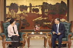 Permanent Deputy Prime Minister Pham Gia Tuc (R) and AIIB President Zou Jiayi (Photo: VNA)