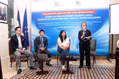 Speakers at the event. (Photo: VNA)