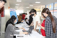 Workers in Bac Ninh province receive health check-ups. (Photo: daibieunhandan.vn)