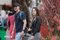 Foreign tourists visit Hanoi on the Lunar New Year. (Photo: VNA)