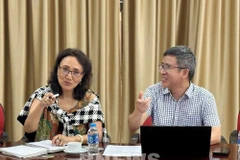 Bagie Sherchand, Director of Strategic Partnerships and Alliances at the National Cooperative Business Association – CLUSA International (left) and Ngo Xuan Nam, Deputy Director of the Vietnam Sanitary and Phytosanitary Notification Authority and Enquiry Point at a working session in Hanoi on June 5. (Photo: VNA)