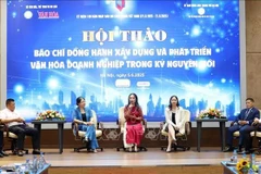 At the seminar on the press’s role in the building of corporate culture in the new era, held in Hanoi on June 5. (Photo: VNA)