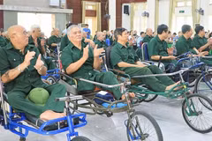 People with meritorious service to receive gifts on War Invalids and Martyrs' Day (Photo: qdnd.vn)