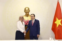 National Assembly Chairman Tran Thanh Man (R) receives OIF Administrator Caroline St-Hilaire (Photo: VNA)