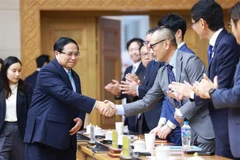 Prime Minister Pham Minh Chinh and delegates at the event (Photo: VNA)