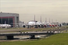 Aircraft park at Bangkok Suvarnabhumi Airport in Bangkok, Thailand. (Photo: AFP/VNA)