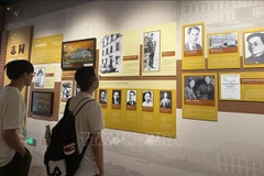 Visitors at the exhibition (Photo: VNA)
