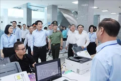State President Luong Cuong visits the Quang Ninh one-level public administrative service centre on July 29. (Photo: VNA)