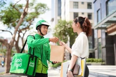 GrabMart, Grab's online grocery platform, positions itself as an express shopping assistant. (Photo: VNA) 