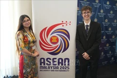 Pedro Toscano (L) and Florencia Camila Gomez represents Vietnam at the first-ever ASEAN Model competition held in Buenos Aires. (Photo: Vietnamese Embassy in Argentina)