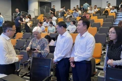 Representatives of Ho Chi Minh City City authorities meet with overseas Vietnamese scientists (Photo: nhandan.vn)