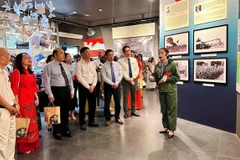 People visit the special exhibition entitled “From the Paris Peace Accords to the Spring 1975 Victory” at the War Remnants Museum in Ho Chi Minh City. (Photo: sggp.org.vn)