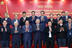 Party General Secretary To Lam (fourth, left) and delegates at the event (Photo: VNA)