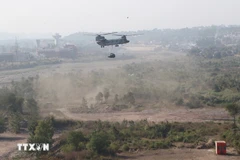 Aircraft drop disaster relief supplies during VINBAX 2024. (Photo: VNA)