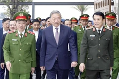 Party General Secretary To Lam (centre) during a working visit to the National Data Centre No.1 at Hanoi's Hoa Lac Hi-Tech Park on December 29. (Photo: VNA)