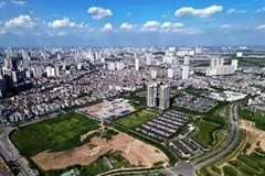 Vietnam is becoming a new hub in the regional supply chain, leading to a sharp increase in demand for industrial real estate, logistics and housing for foreign experts. (Photo: VNA)