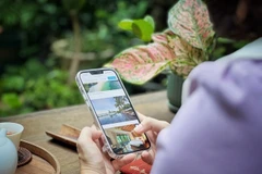 Travellers now enjoy richer experiences with diverse destination options available right at their fingertips via online platforms. (Illustrative photo: VietnamPlus)