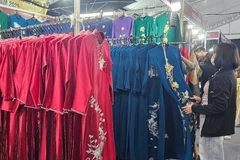 Garment and fashion products by Vietnamese enterprises are showcased at the fair. (Photo: VNA)